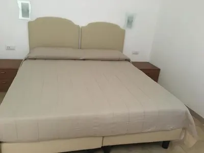 Letto o letti in una camera di Appartamento Villanova