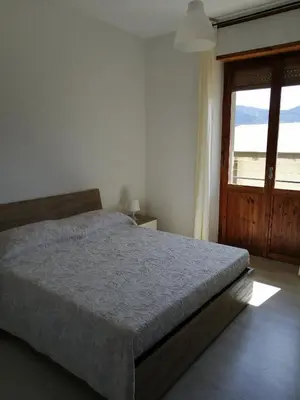Letto o letti in una camera di Da zia Mariuccia