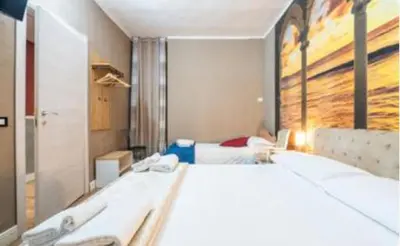 Letto o letti in una camera di Yaki Domo