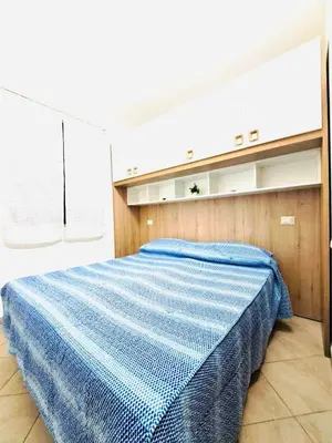 Letto o letti in una camera di Un Gioiellino a Costa Rei Centro - Al mare a piedi