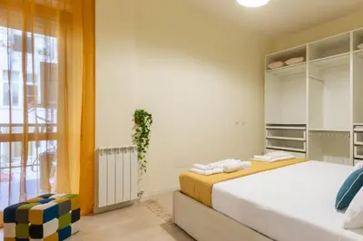 Letto o letti in una camera di Sonnino House