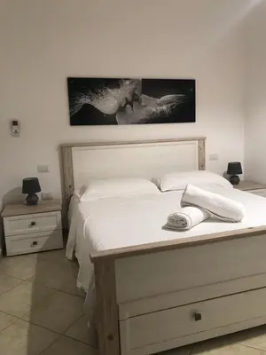 Letto o letti in una camera di Domu Bonora
