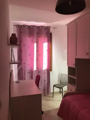 Letto o letti in una camera di Domu Bonora