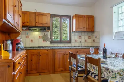Cucina o angolo cottura di [COSTA REI] *500 metri dal mare* Free Parking/Wifi