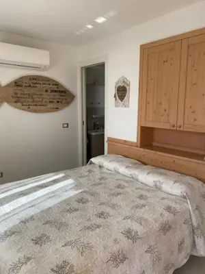 Letto o letti in una camera di Casa Vacanze Costa Rei