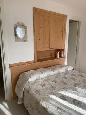 Letto o letti in una camera di Casa Vacanze Costa Rei