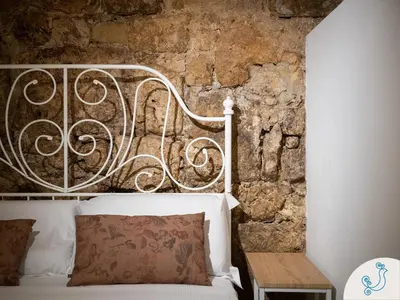 Letto o letti in una camera di La Corte 43 - Charming apartment