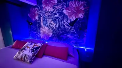 Letto o letti in una camera di Open Suite Cobalto