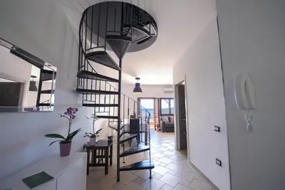 Letto o letti in una camera di Villa Altair