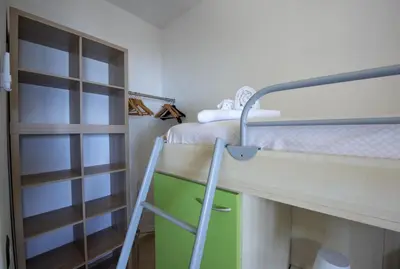 Letto o letti a castello in una camera di Villa Altair