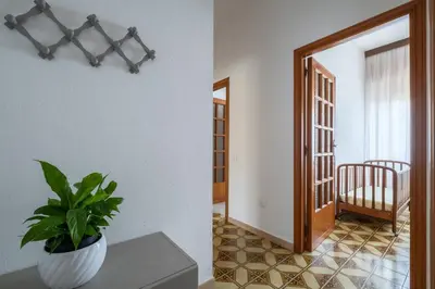 Letto o letti in una camera di Casa Hibiscus Villasimius