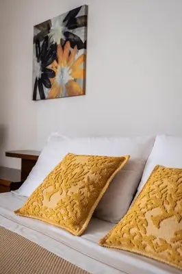 Letto o letti in una camera di Casa Hibiscus Villasimius