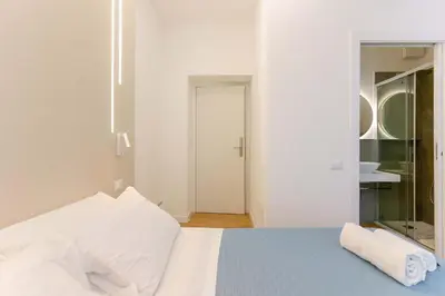 Letto o letti in una camera di Aqua Comfort Rooms - Eja Sardinia