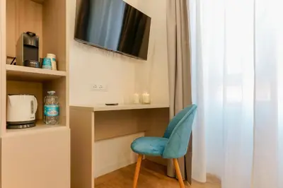 TV o dispositivi per l'intrattenimento presso Aqua Comfort Rooms - Eja Sardinia