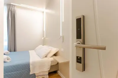 Letto o letti in una camera di Aqua Comfort Rooms - Eja Sardinia