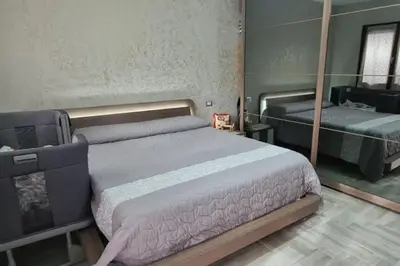 Letto o letti in una camera di Casa Laura, Quartu Sant'Elena