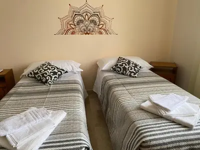 Letto o letti in una camera di L'INCOGNITA