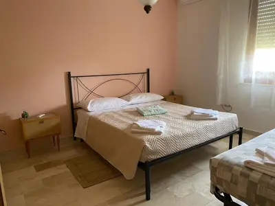 Letto o letti in una camera di L'INCOGNITA
