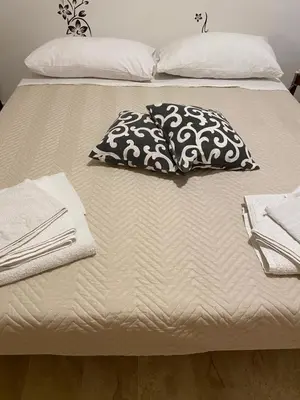 Letto o letti in una camera di L'INCOGNITA