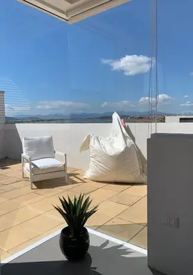 Area soggiorno di Poetto Apartment