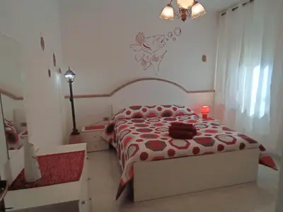 Letto o letti in una camera di Il Sole IUN R0020