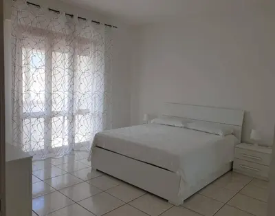 Letto o letti in una camera di South Sardinia Sun and Sea
