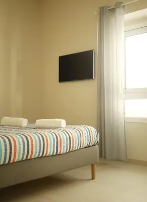 TV o dispositivi per l'intrattenimento presso Boedo Apartments