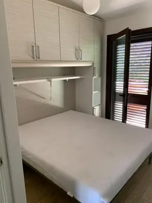 Letto o letti in una camera di Casa Pina