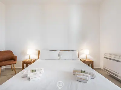 Letto o letti in una camera di Poetto Panoramic Apartment