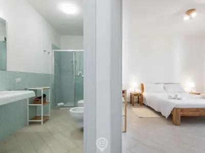 Letto o letti in una camera di Poetto Panoramic Apartment