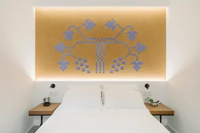 Letto o letti in una camera di tèmporas Design Rooms
