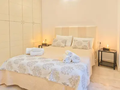 Letto o letti in una camera di Oidu - Cagliari Suites