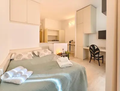 Letto o letti in una camera di Oidu - Cagliari Suites