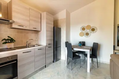 Cucina o angolo cottura di Donatello Home stay - Villasimius
