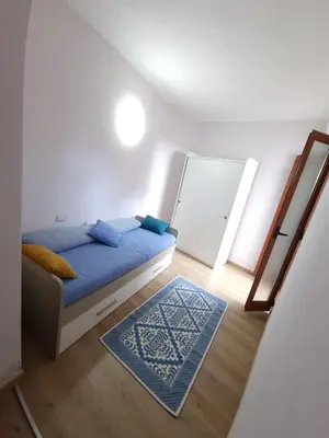 Letto o letti in una camera di Villa Quattro Archi