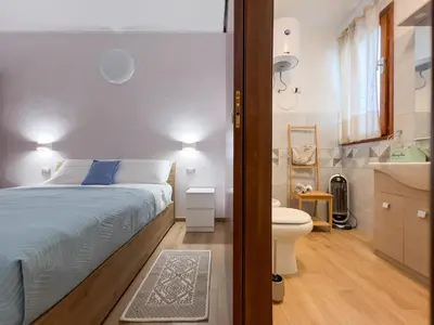 Letto o letti in una camera di Villa Quattro Archi