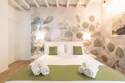 Letto o letti in una camera di Metropolitan Rooms