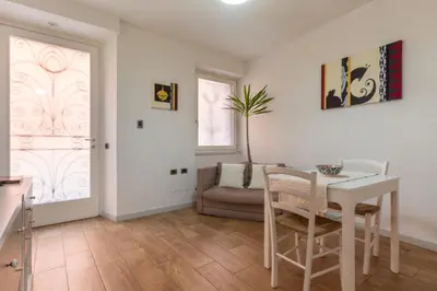 Area soggiorno di Villanova Apartment