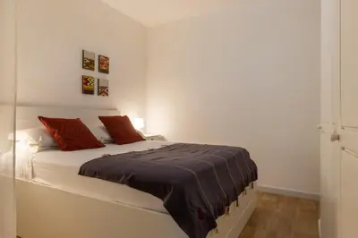 Letto o letti in una camera di Villanova Apartment