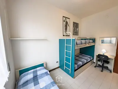 Letto o letti in una camera di Casa Nina