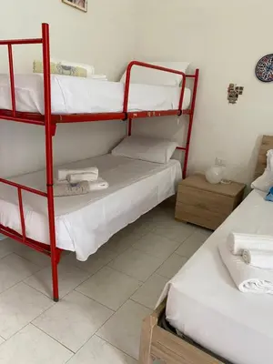 Letto o letti in una camera di GH Al Fortino Bilocale con Giardino