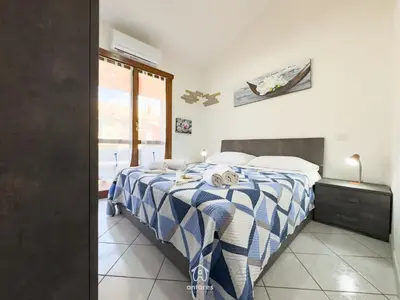 Letto o letti in una camera di Lumier