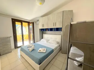 Letto o letti in una camera di Casa Arcobaleno Ippogrifo
