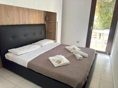 Letto o letti in una camera di Casa Arcobaleno Ippogrifo