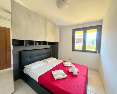 Letto o letti in una camera di Casa Arcobaleno Ippogrifo