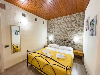 Letto o letti in una camera di Domu Francisca