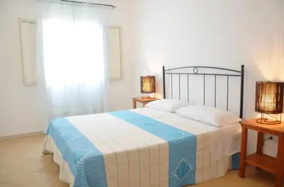 Letto o letti in una camera di Appartamento Genziana
