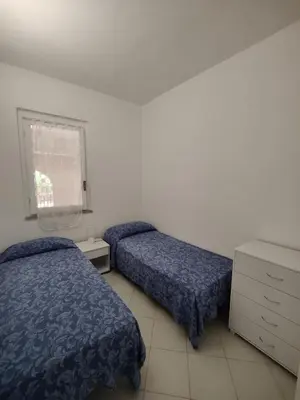 Letto o letti in una camera di Casa Luna