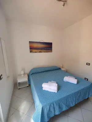 Letto o letti in una camera di Casa Luna