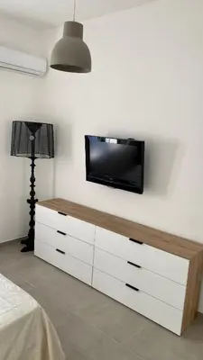 TV o dispositivi per l'intrattenimento presso Appartamento appena ristrutturato completo di tutti i comfort a un passo dal centro